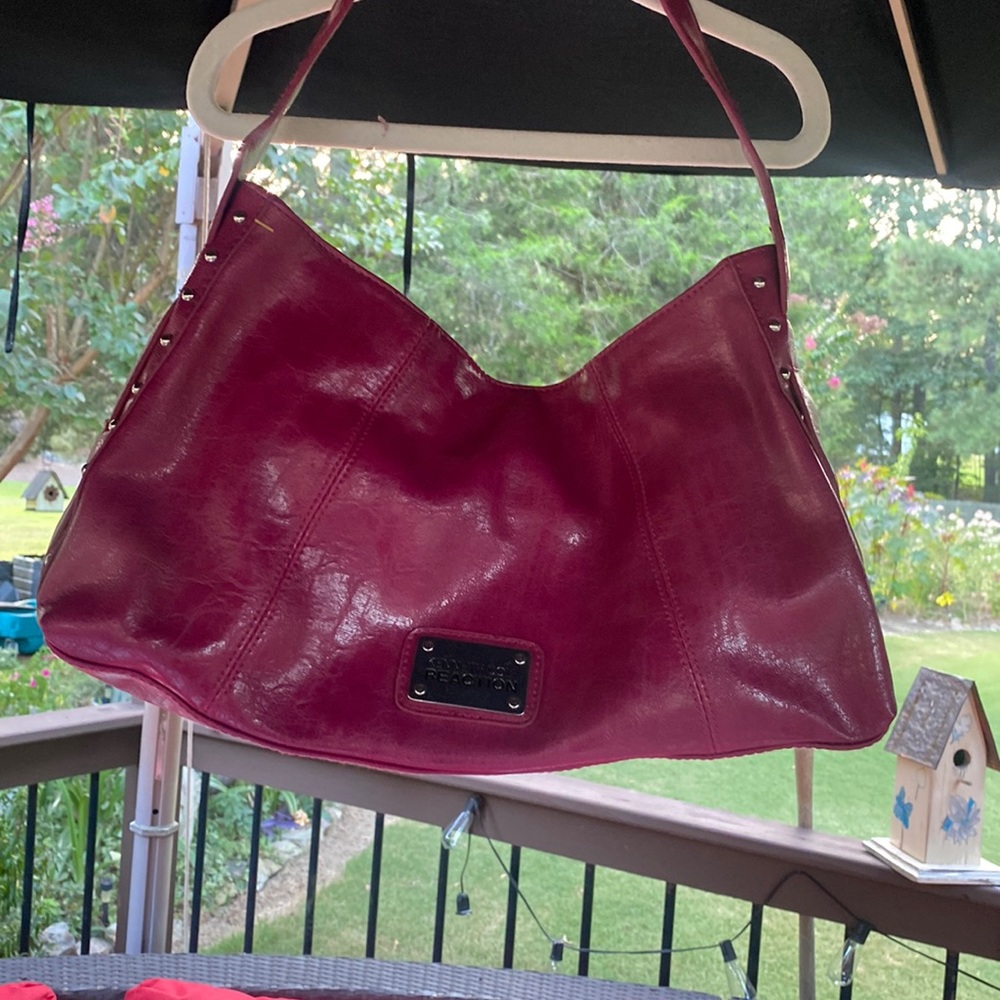 Kenneth Cole pocketbook. Like new condition.